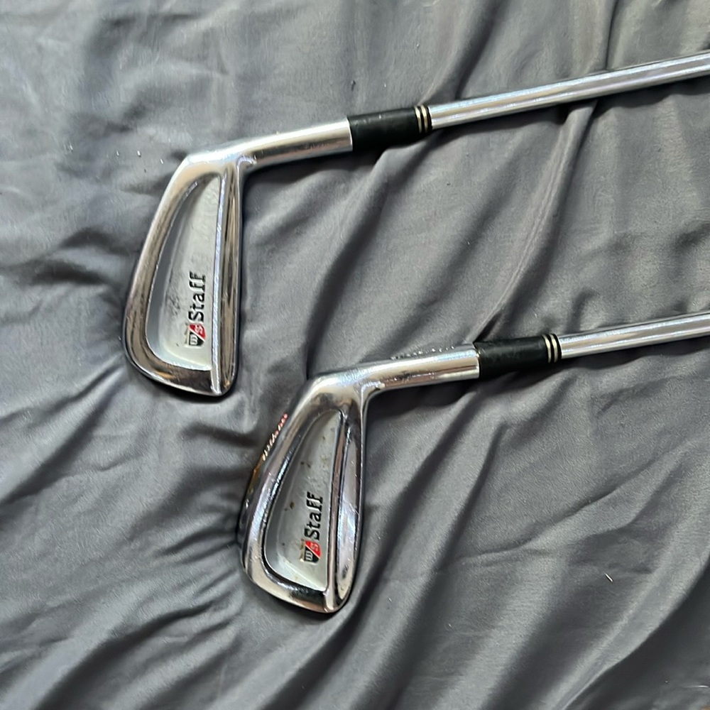 4 and 5 iron Wilson golf clubs.